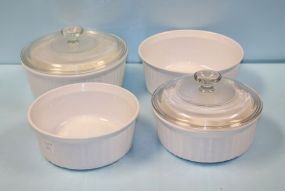 Four White Corningware Bowls & Two Clear Lids