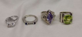 Four Stamped Sterling Silver Lady's Simulated Gemstone Rings