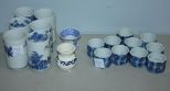 Ten Blue and White Porcelain Napkin Rings, Six Cups, Two Toothpick Holders