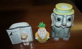 Japanese Ceramic Elephant Bank, Ressin Santa/Pineapple Ornament, and Child Praying Ceramic Vase