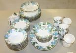 Poppytrail Set Consisting of 8 dinner plates, 8 salad plates, creamer, sugar, 8 cereal bowls, 8 cups, 8 saucers, vegetable bowl, large platter. 44 total pieces.