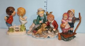 Two Hand Painted Couple Figurines and One Hand Painted Figurine of Two Boys Playing with a Dog