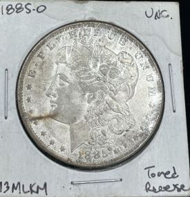 1885-O UNC Morgan Silver Dollar Toned Reverse