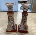 Pair of Red Ceramic Candle Holders