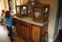 Chocolate Server, marble topped bevel glass mirror and showcases.