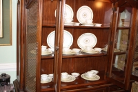 China cabinet part of a Thomasville Dining set filled with Wedgewood Appledore China